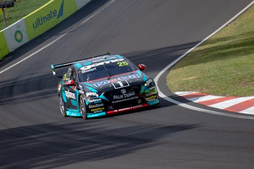 Blue and Black Sport Car on Racing Track