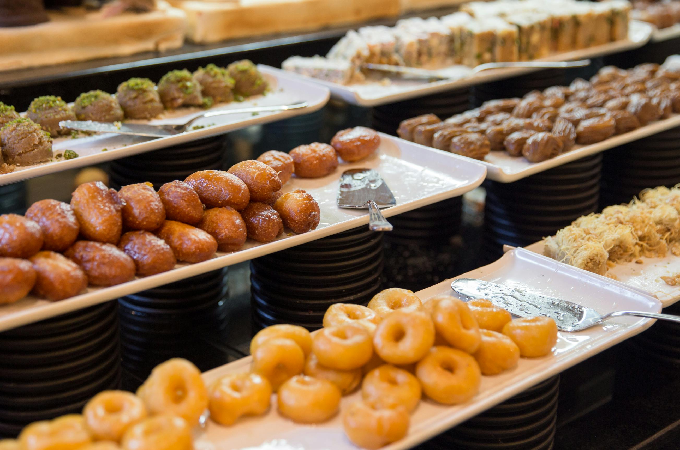 Donuts and Bagel Display · Free Stock Photo
