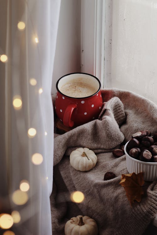 Free A Cup of Coffee Near White Curtain Stock Photo