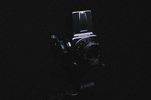 Black Vintage Camera with Dark Background