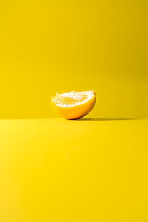 Lemon on Yellow Surface