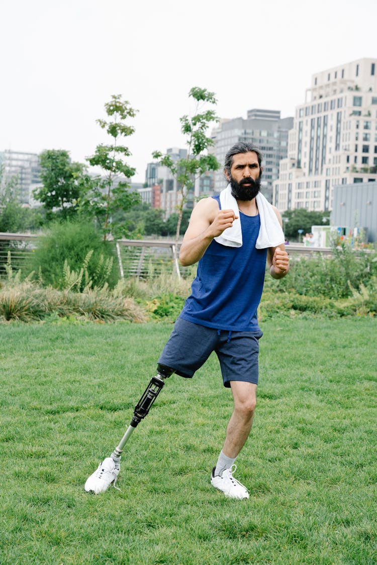 Man With Prosthetic Leg Doing Exercise