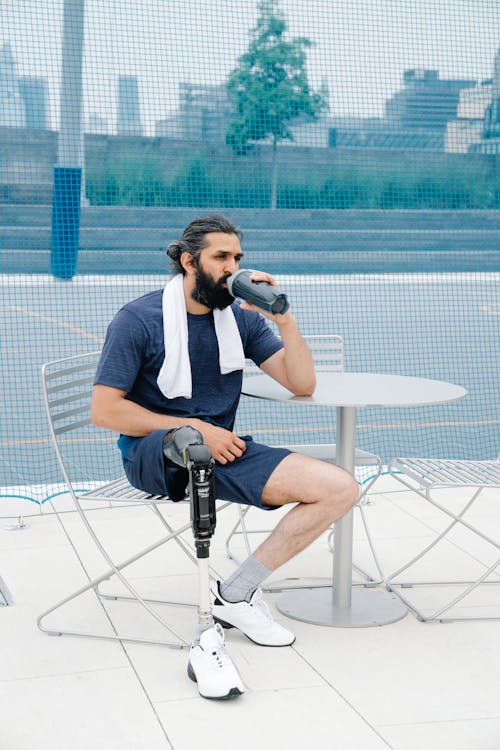 Man in drinking Water after Workout 