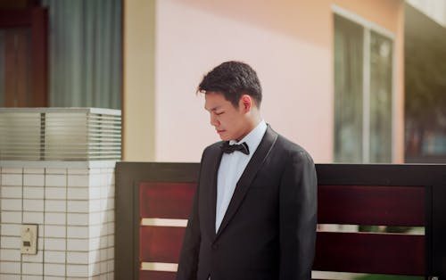 Free Photo of the Groom Wearing His Tuxedo Stock Photo