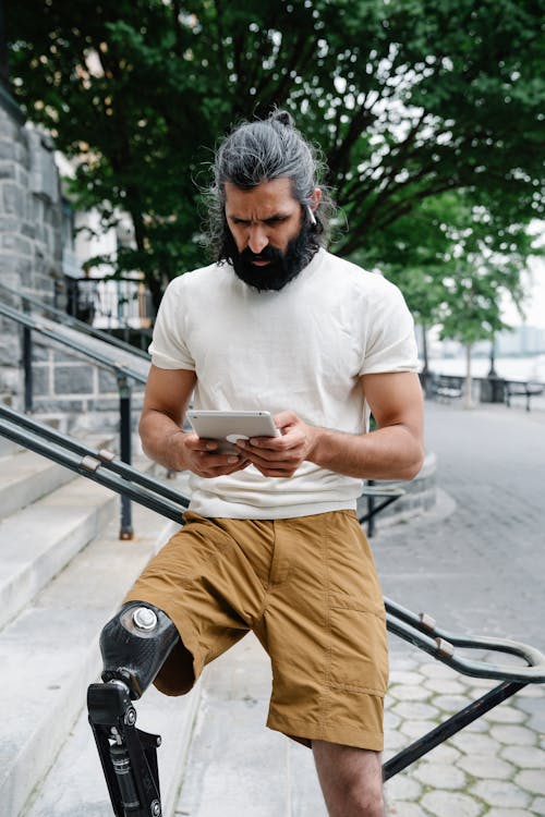 Man looking at a Tablet 