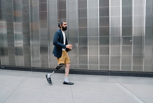 Man walking with Prosthetic Leg 