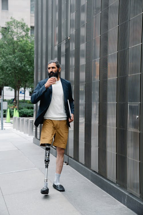 Man walking with a Prosthetic Leg 