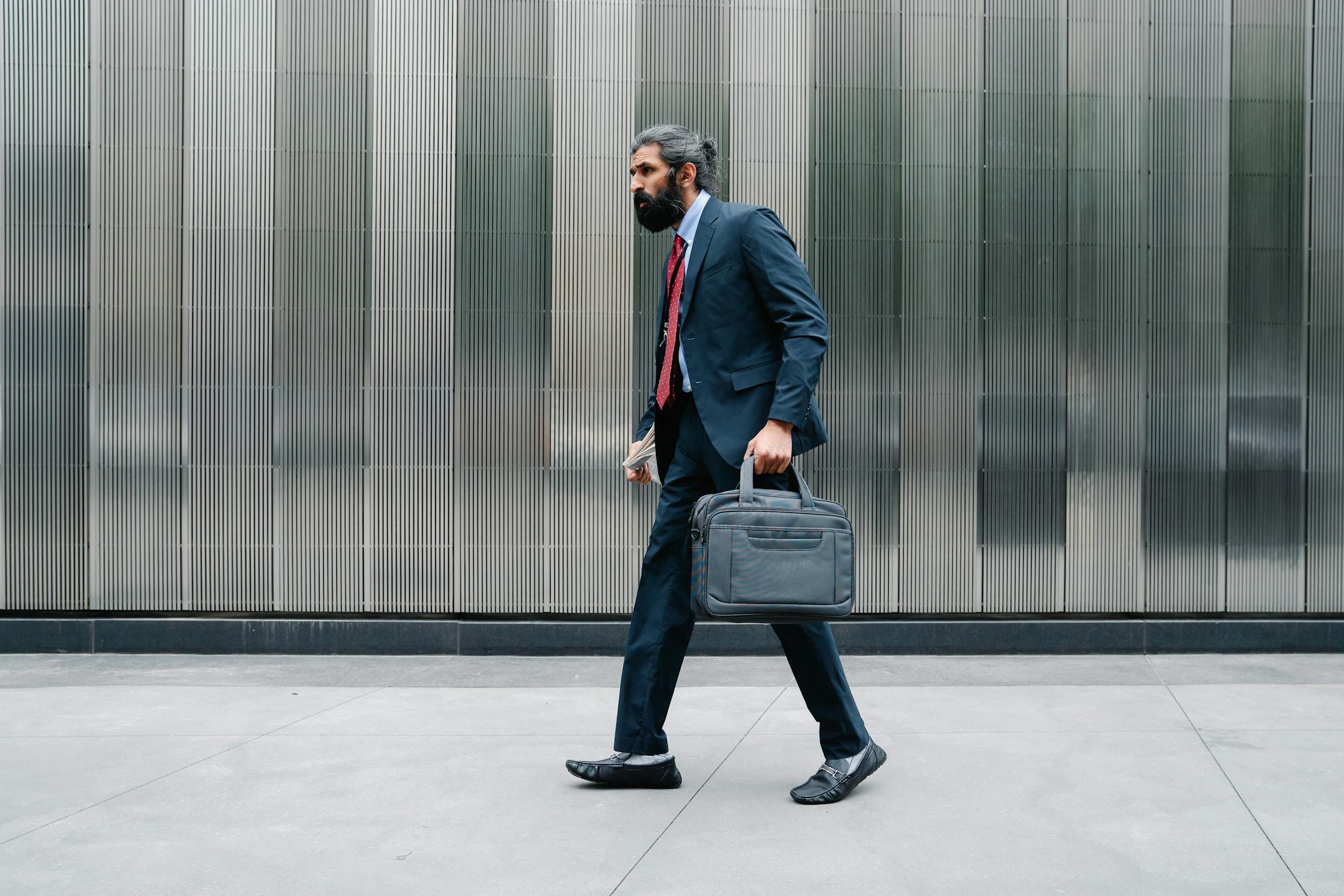 Man walkin in Full Business Attire · Free Stock Photo