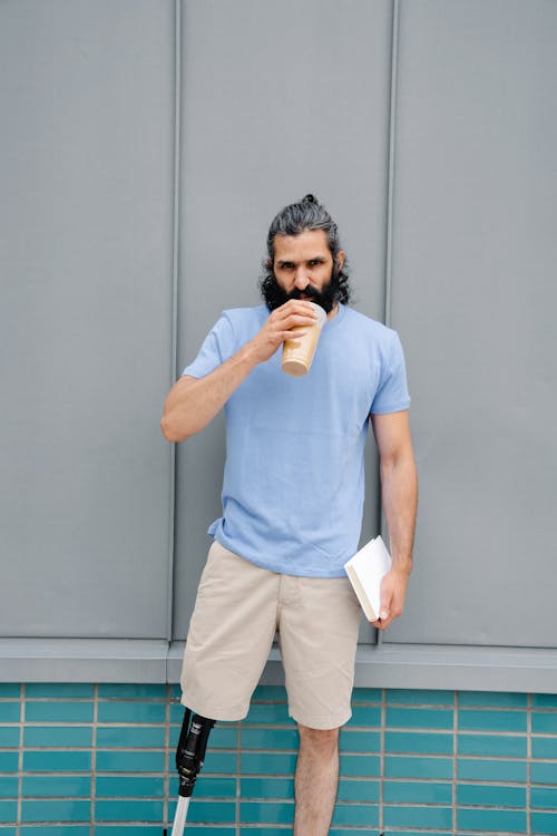 Man sipping Iced Coffee