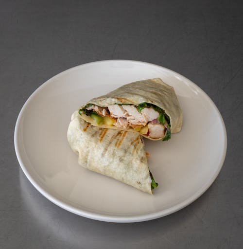 Free White Ceramic Round Plate With Chicken Wrap Sandwich Stock Photo