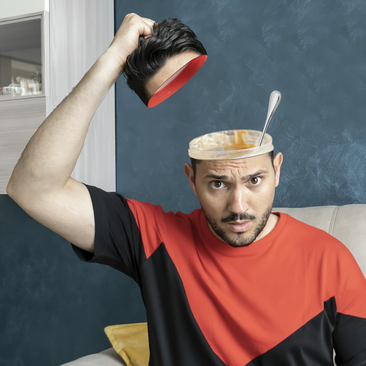 Man wearing performance joggers, technical jacket and sneakers in a city environment