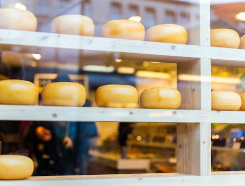 Cheese Wheels on the Shelves