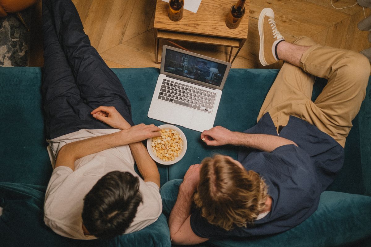 Teenagers watching a film together
