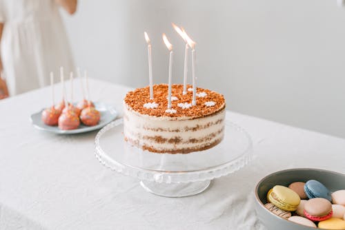 Free Lighted Candles on a Cake Stock Photo