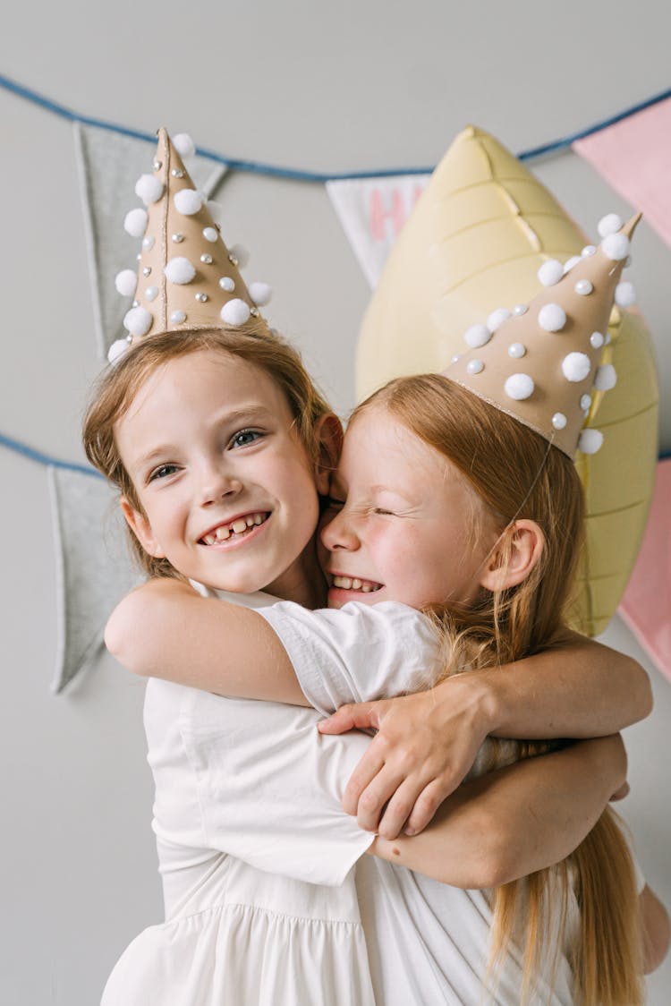 Photograph Of Girls Hugging