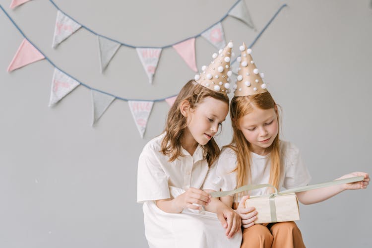 Two Girls Unboxing A Birthday Gift