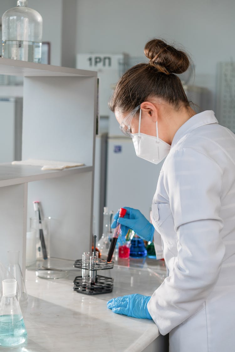 A Female Doctor Inside The Lab