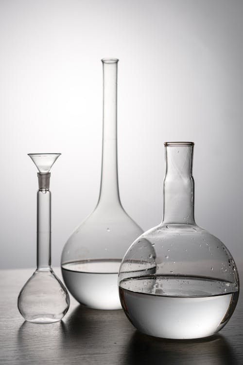Glass Laboratory Vessels Filled with Water