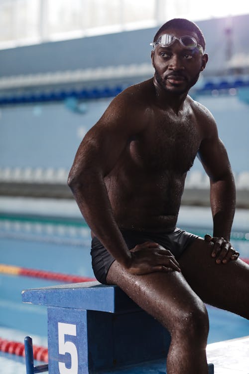 Swimmer Sitting on a Platform