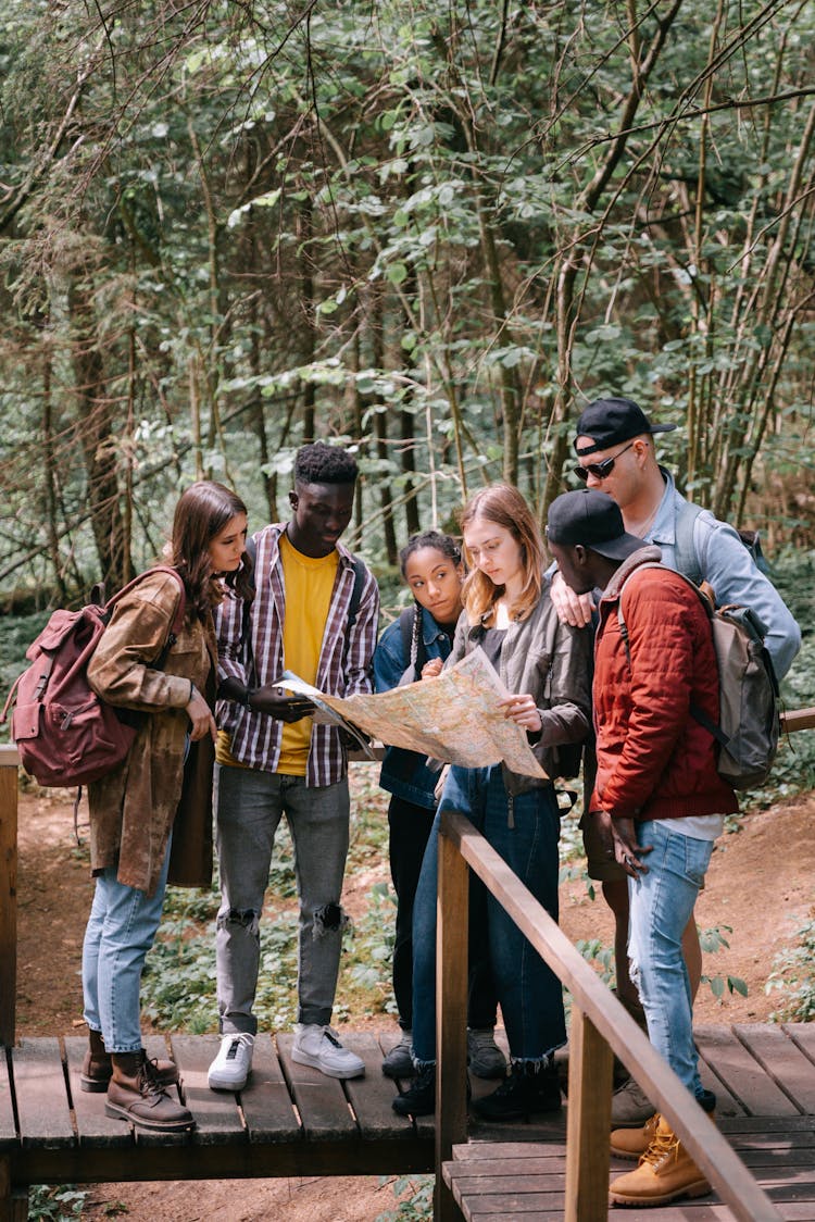 Friends Looking At The Map