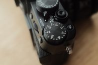 Detailed view of camera settings dial showcasing manual options.