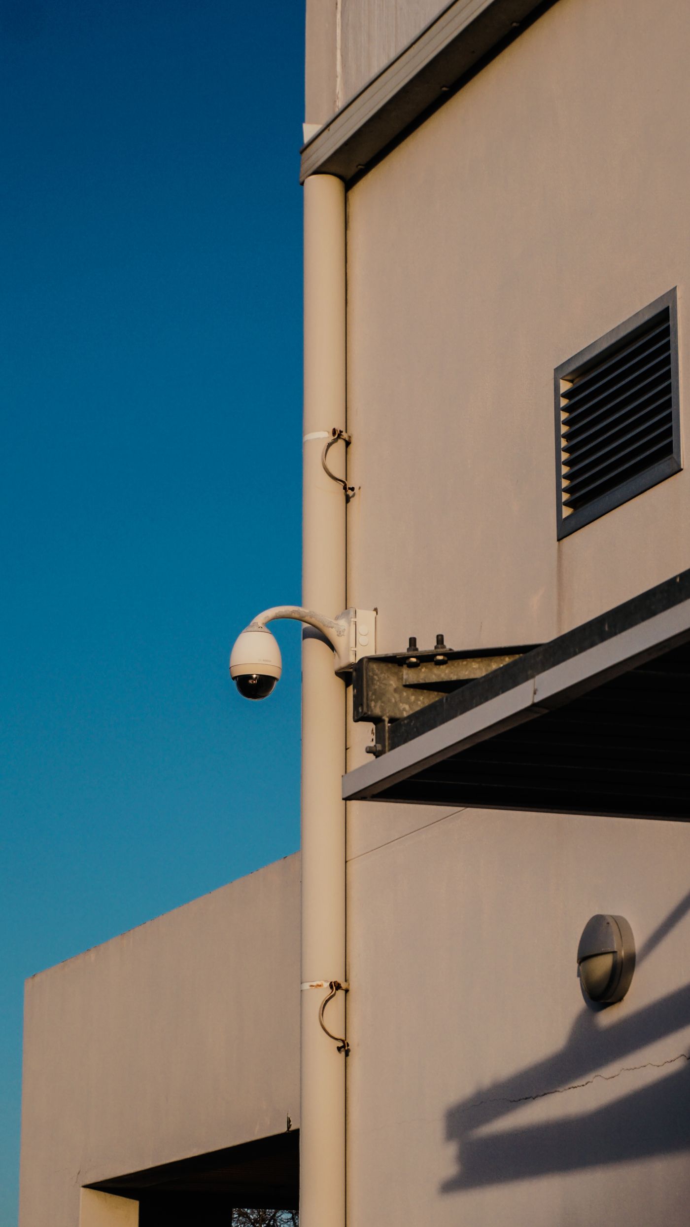Security camera mounted on a modern building in South Africa