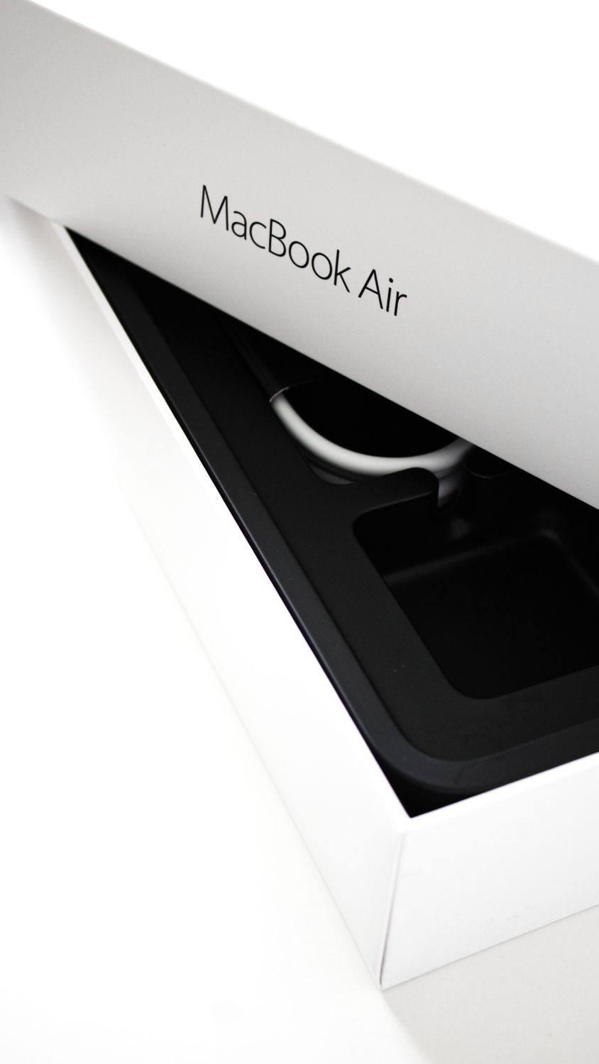 Box Style Apple Computer Macbook Air Box on White Table · Free Stock Photo