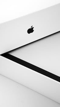 Close-up image showcasing the sleek design of Apple product packaging. Ideal for minimalist themes.