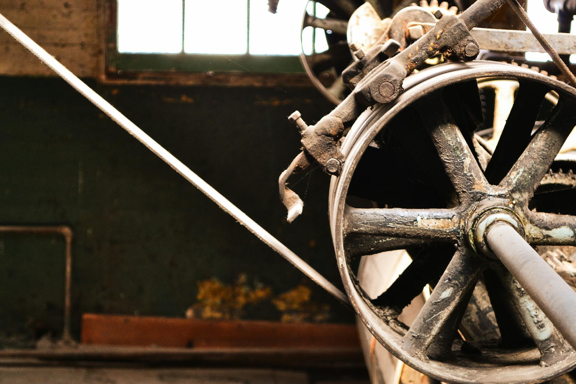 Closed Up Photo of Brass-colored Industrial Machine