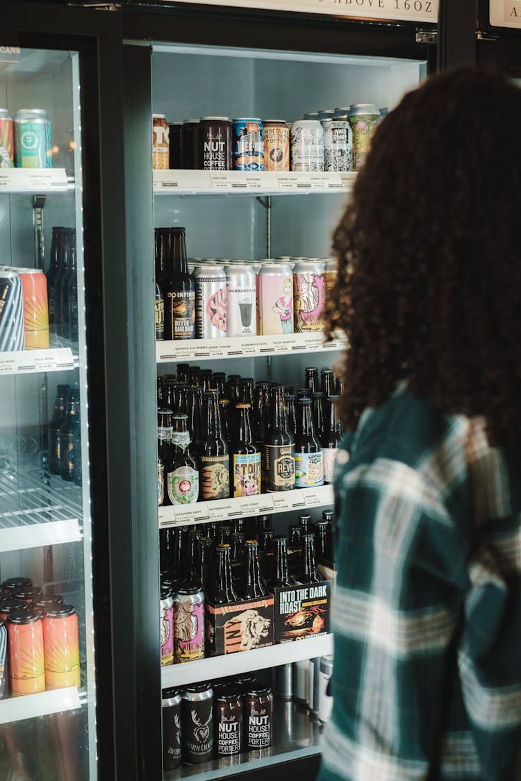 Photo Of Beer Bottles In A Refrigerator