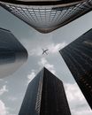 Airplane Flying over the City