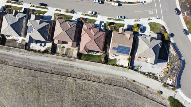 Overhead view of suburban houses with solar panels in Dublin, CA neighborhood.