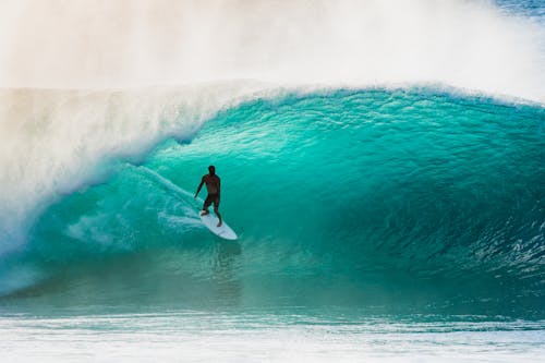 A Person Surfing a Wave