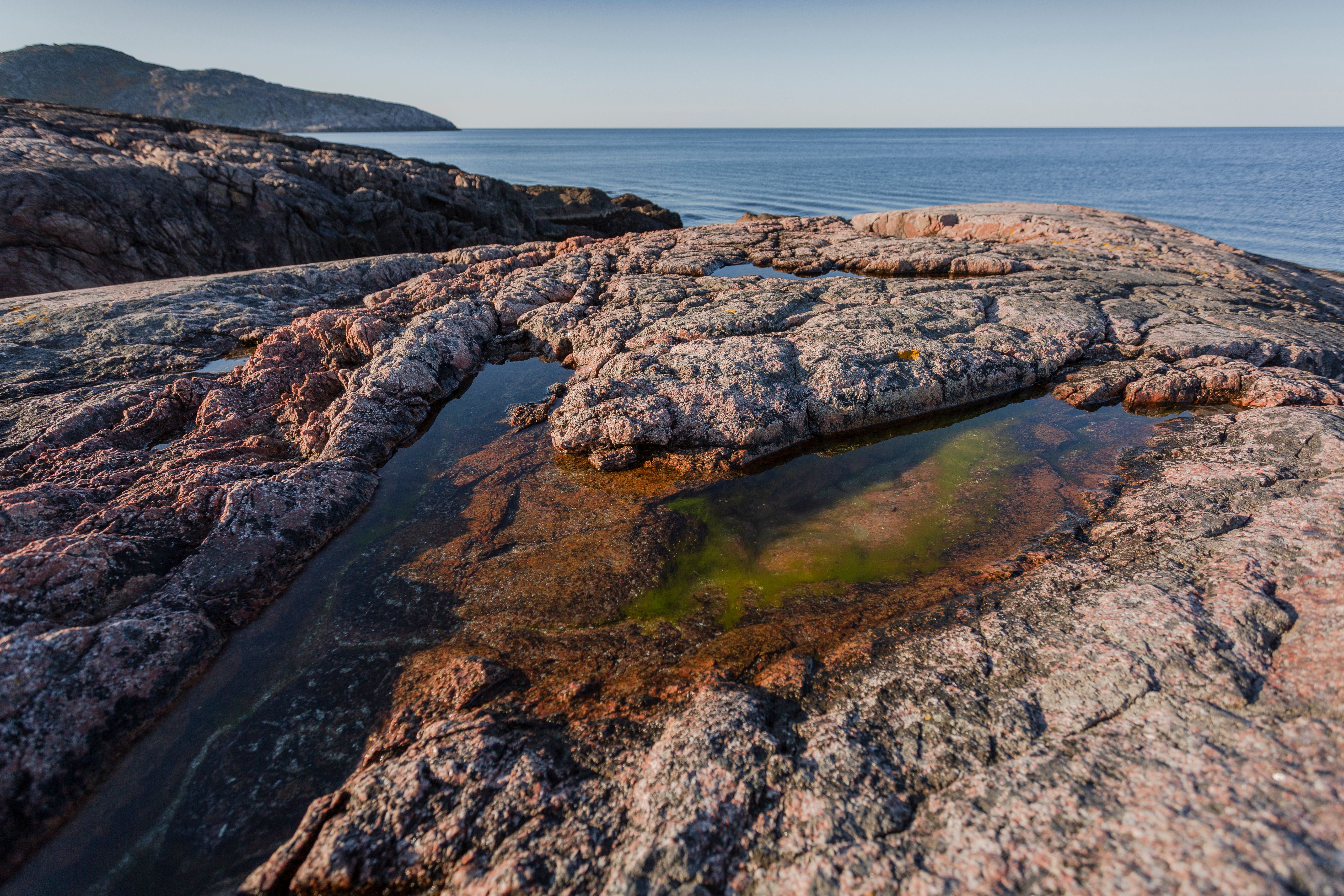 Brown Rock Formation on Sea Shore · Free Stock Photo