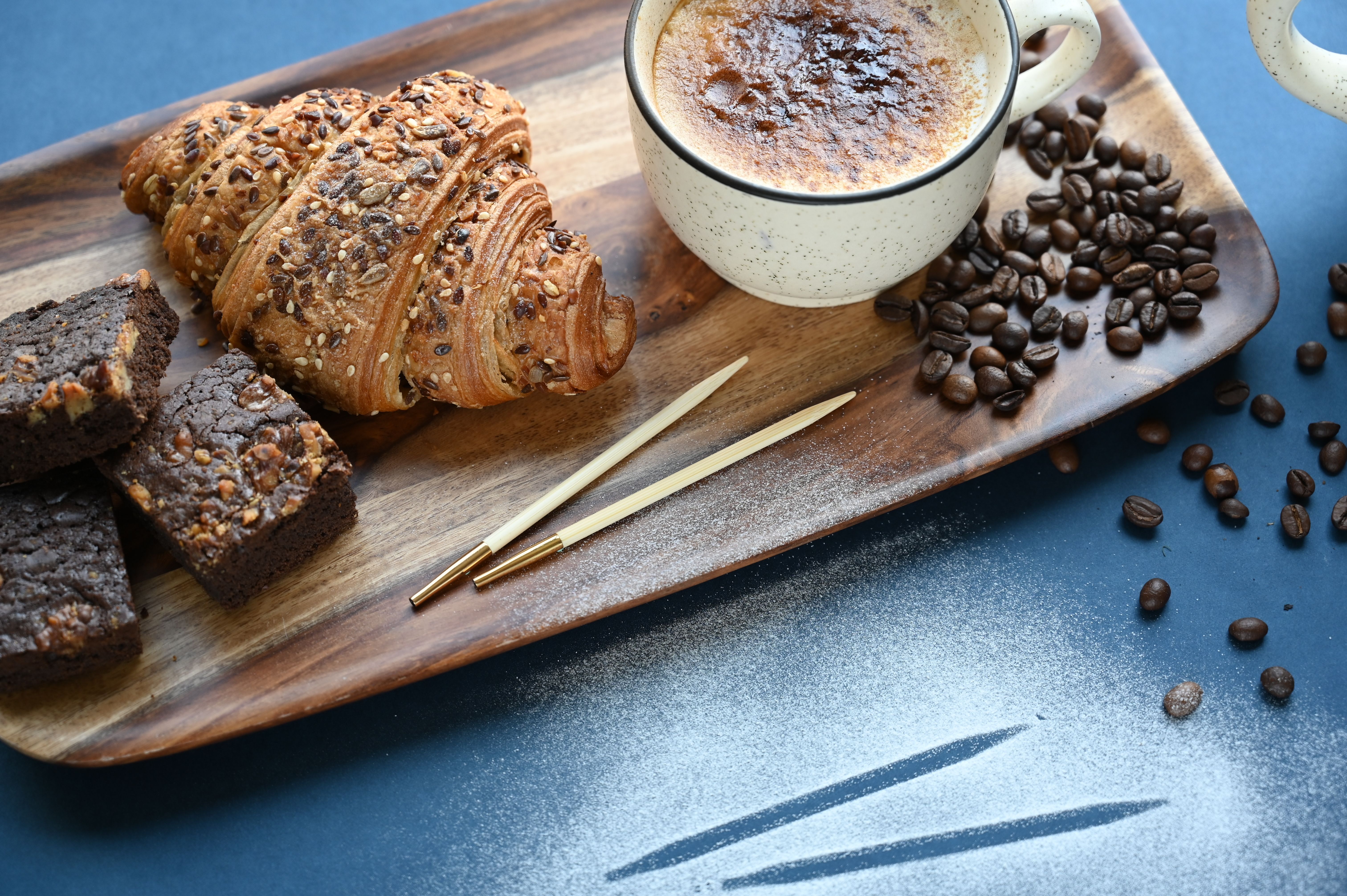 Butter croissant on a tray at Ember & Grain
