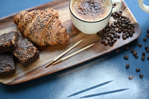 Free A Pair of Knitting Needles on a Tray of Delicious Breakfast  Stock Photo