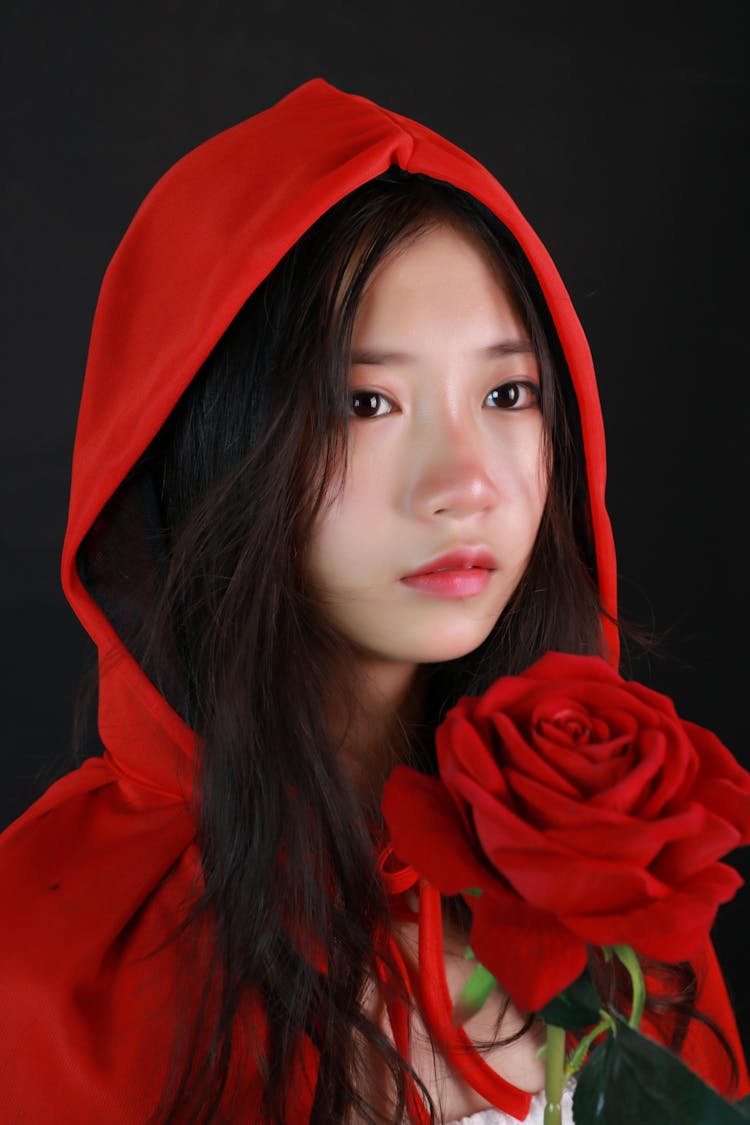 Young Girl In Red Hooded Cape 