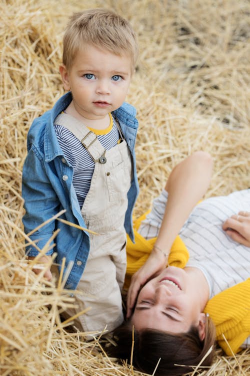 Little Boy in Denim Shirt with Her Mother 