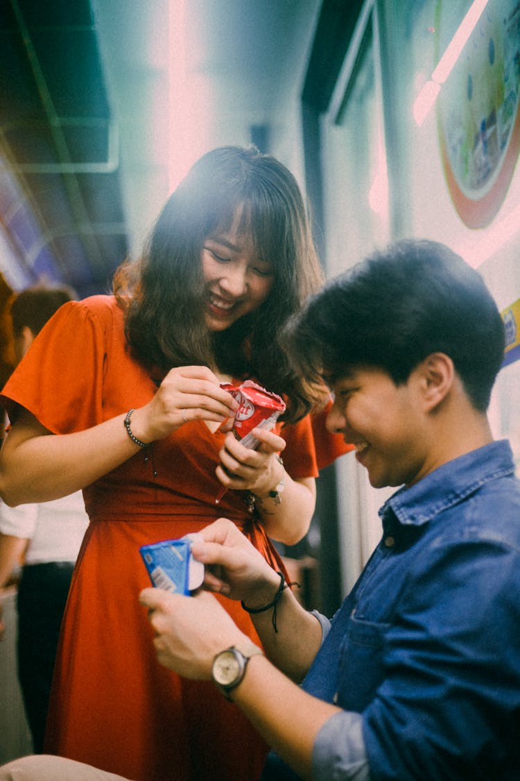 Man And Woman Opening Ice Cream