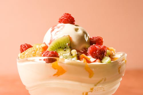 Close-up Photo of Strawberry Ice Cream in Clear Glass Bowl