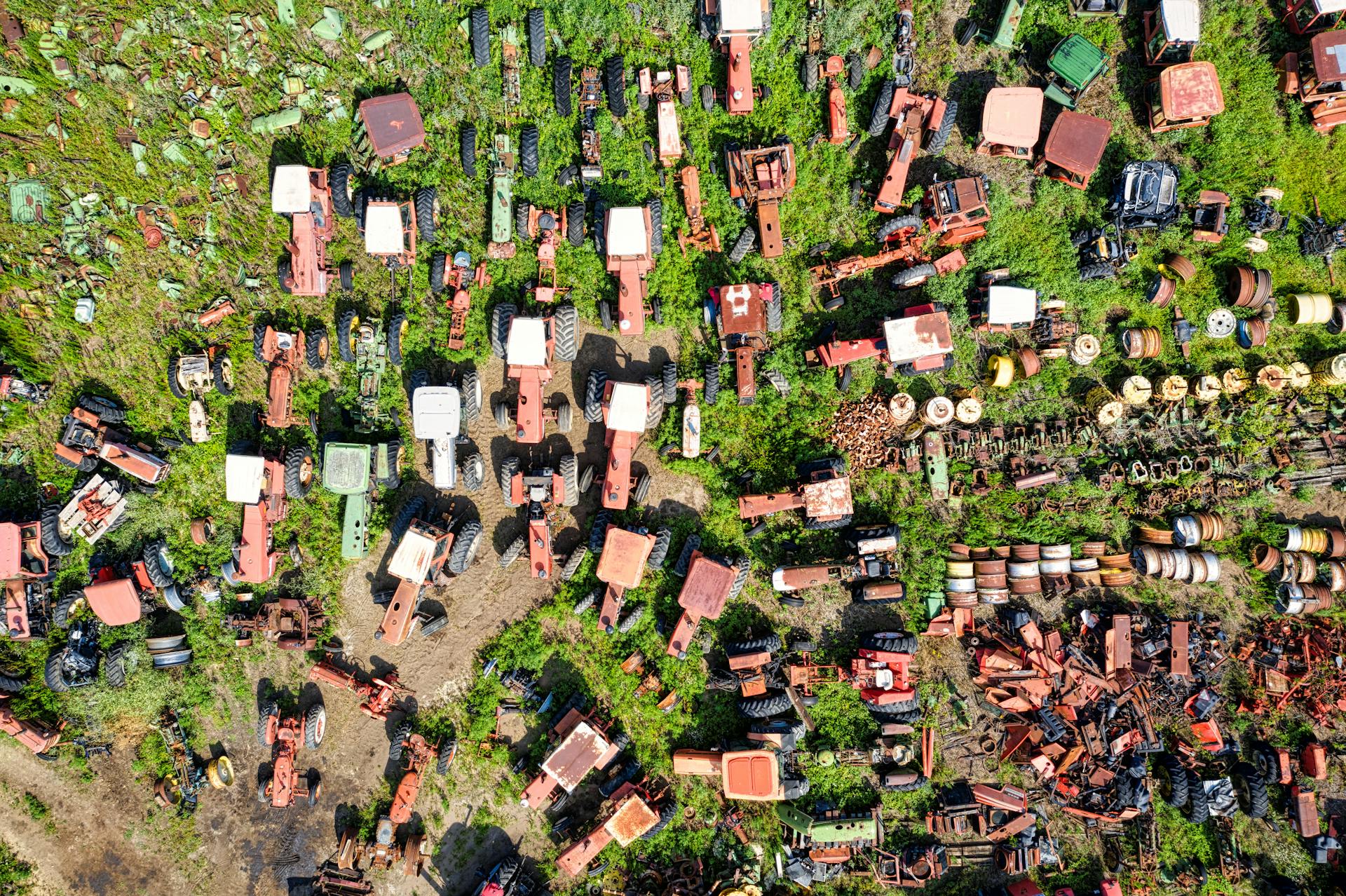 Birds Eye View of Trucks Parked in Grass Field