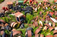 Rusty Round Metal on Grass Field