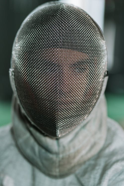 Man in fencing mask 