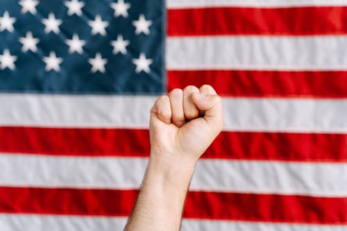 Photos gratuites de activisme, drapeau américain, main