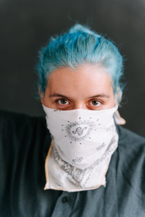 Colored Hair Woman Covering Her Face With Handkerchief