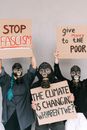 A Group of People Holding Placards