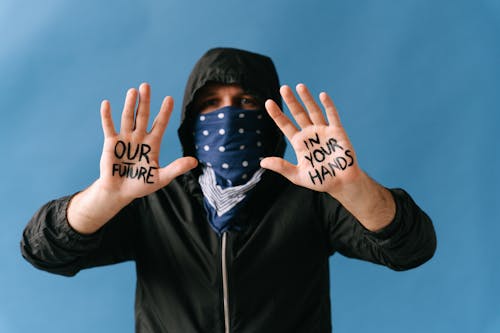 Man with written Text in his Hands 