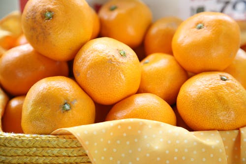 Oranges on a Woven Basket