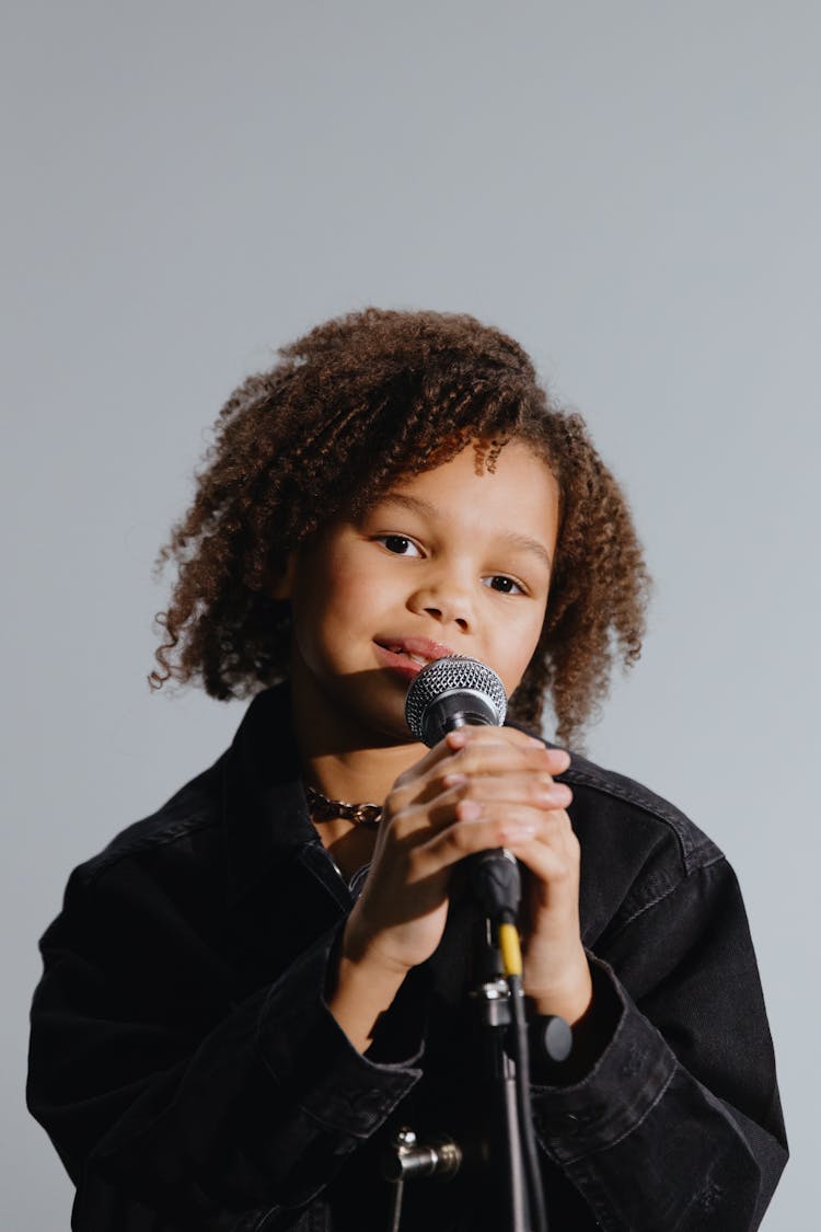 An Afro-Haired Kid Singing