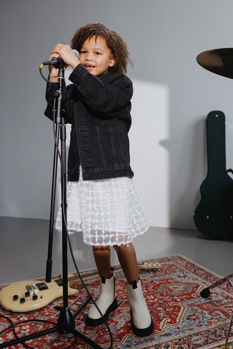 An Afro-Haired Kid Singing